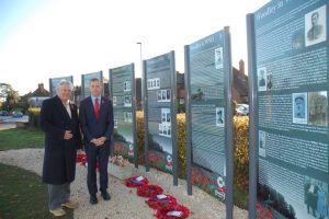 Cllr Keith Baker and Matt Rodda MP surveying Woodley World War 1 Information Panels