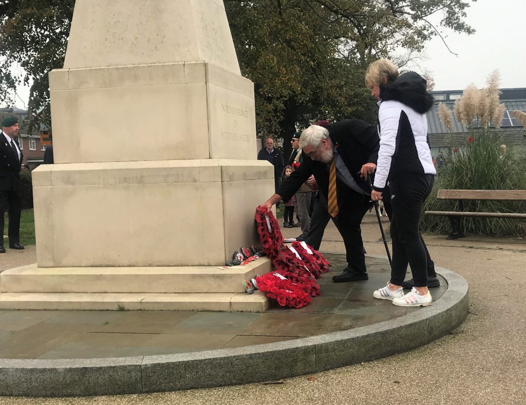 A wreath being laid at Woodley War Memorial