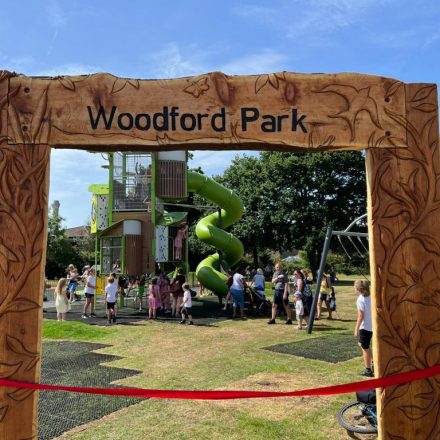 Carved wooden Woodford Park Play Area sign