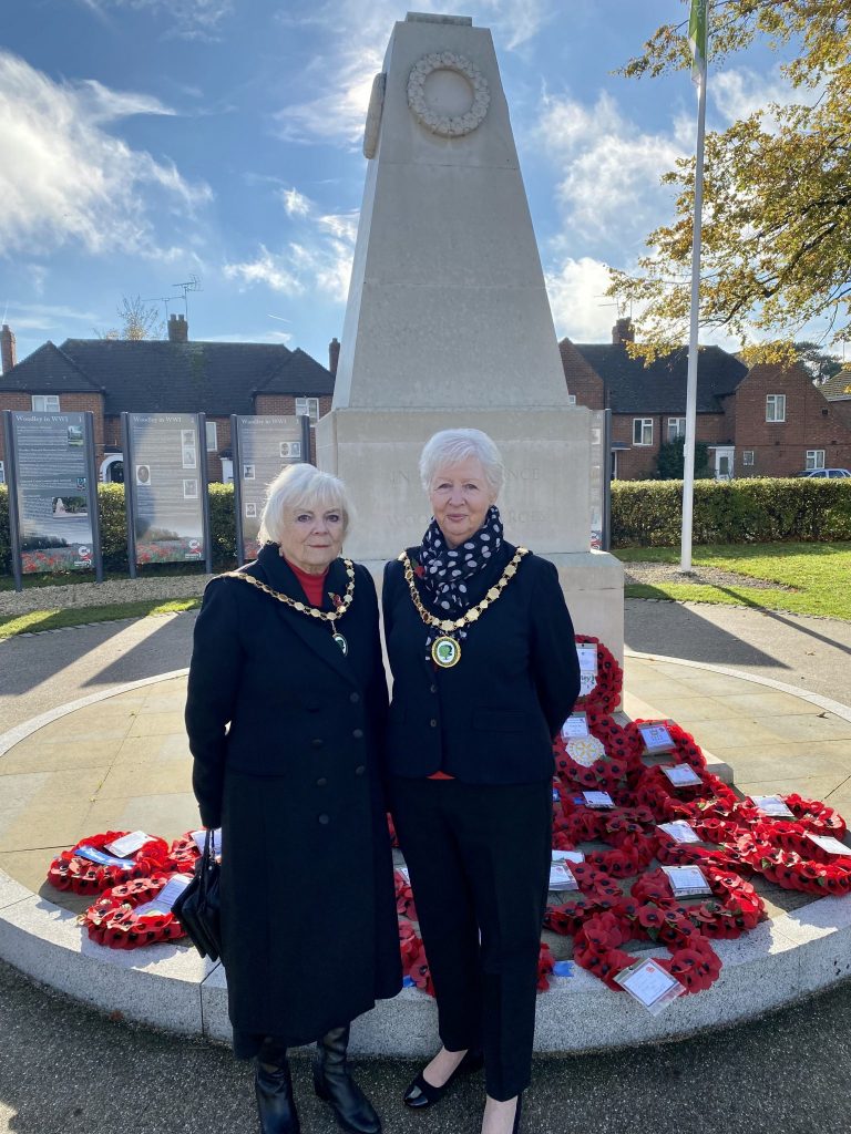 Councillor Janet Sartorel, Town Mayor, and Councillor Kay Gilder, Deputy Town Mayor, standing by Woodley War Memorial