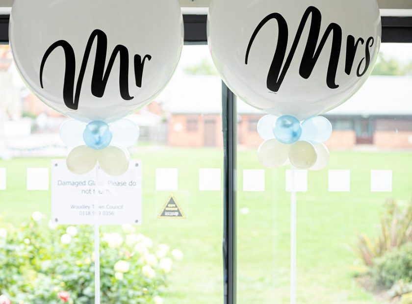Wedding reception top table with Mr & Mrs balloons