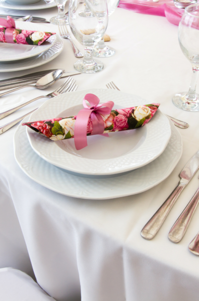 Table set for a wedding reception dinner